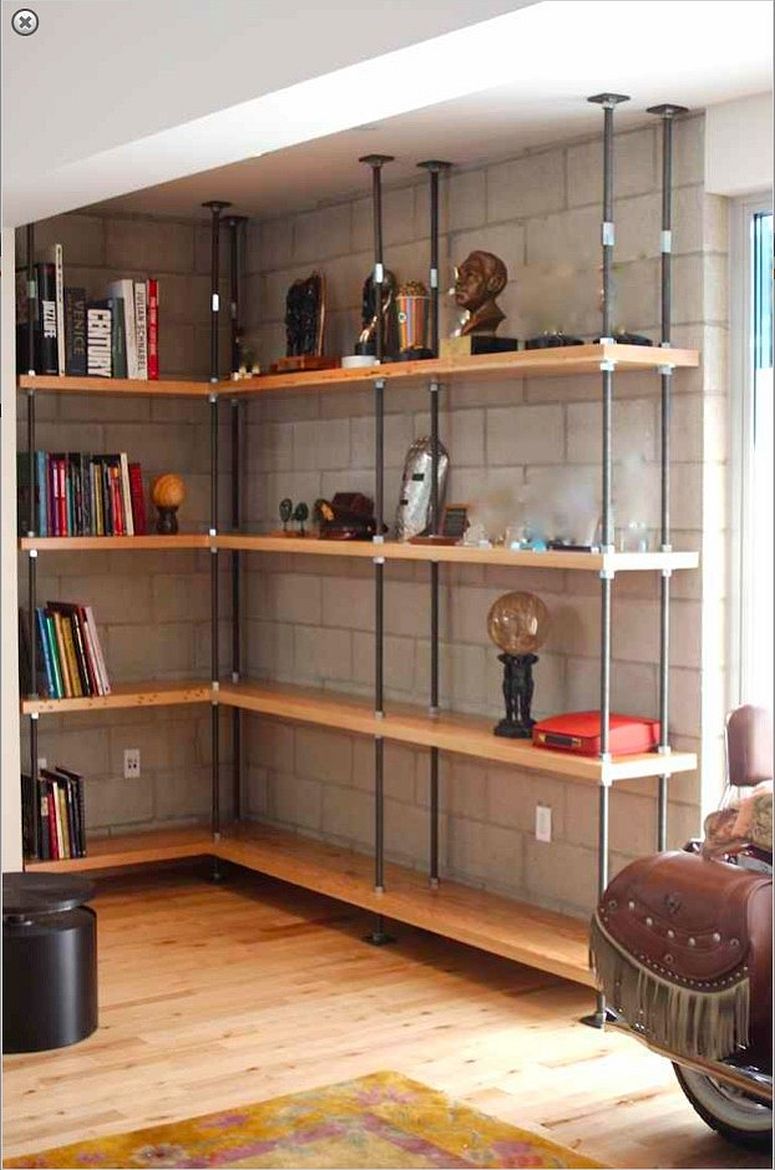 This wood and metal shelf in the living room saves corner space with ease