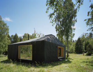 Small Summer House in Sweden Paints a Picture of Minimal Contrasts