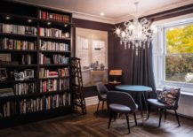 Black-walls-and-a-spacious-bookshelf-give-the-room-a-classic-eclectic-vibe-217x155