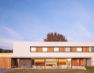 Modern Family Home in White and Wood in a City of Volcanoes