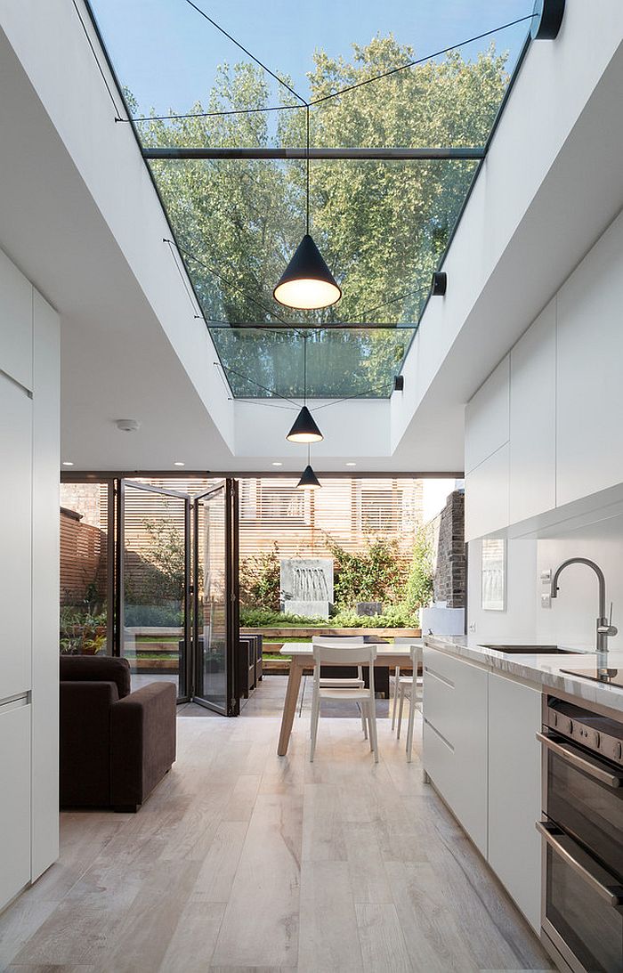 Ceiling windows bring the outdoors inside to give the kitchen a spacious appeal