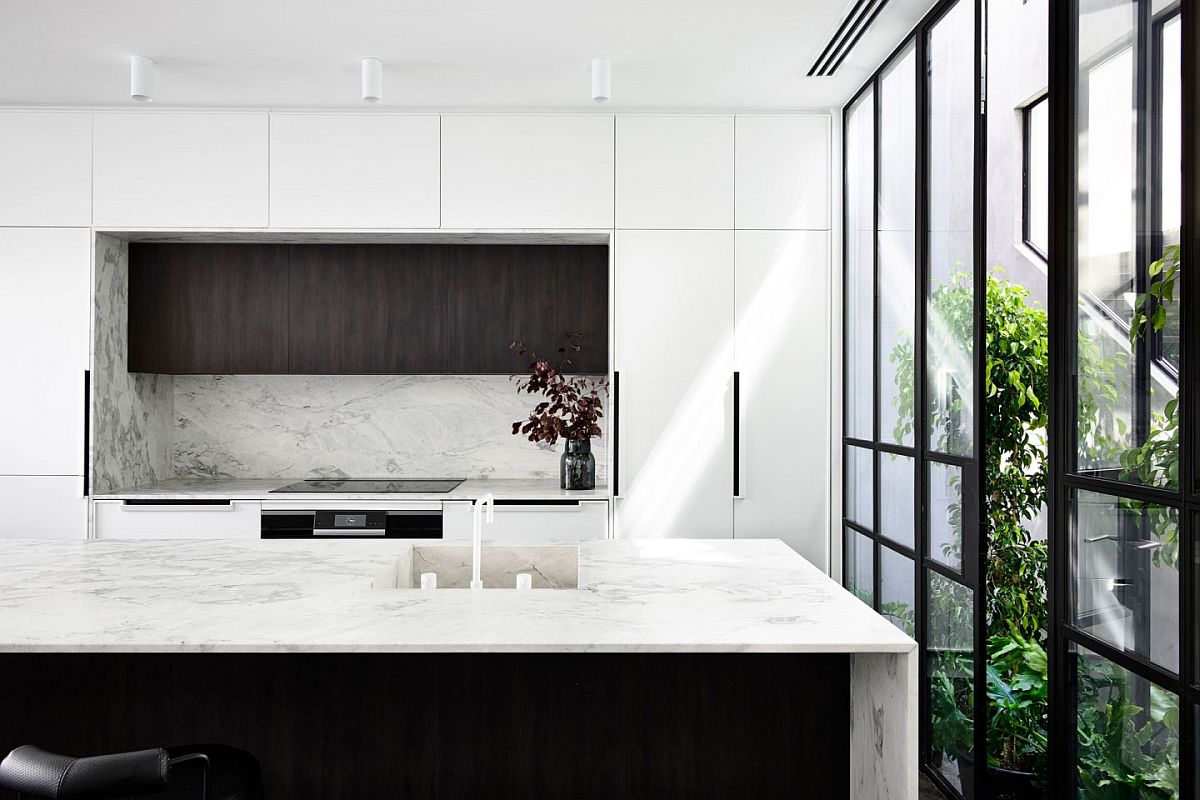 Contemporary-kitchen-in-black-and-white-with-framed-glass-walls