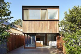 Box-Like Rear Extension in Wood Adds Functional Modernity to this Brick House