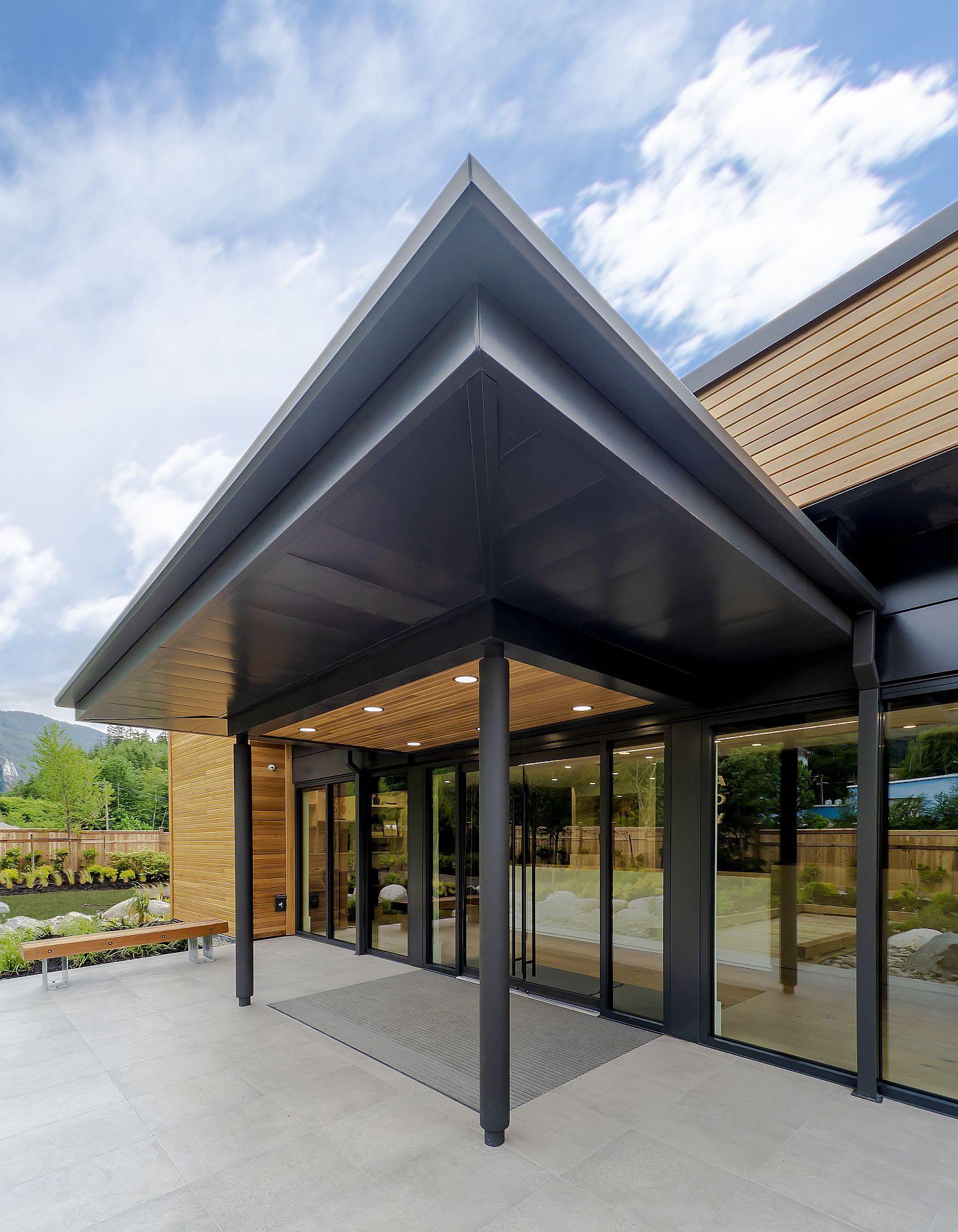 Covered entry and deck adds dramatic charm