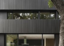 Dark-facade-of-the-house-clad-in-zinc-frame-217x155
