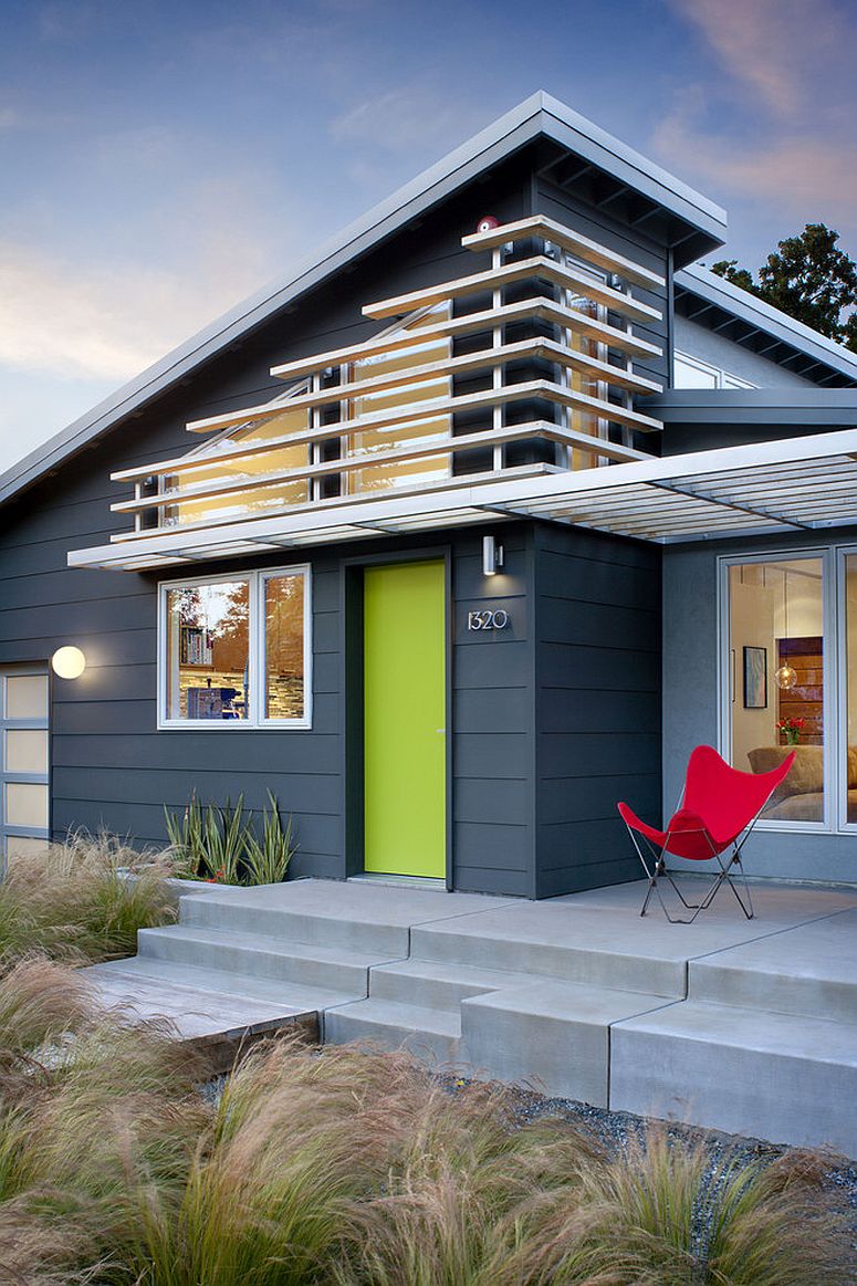 Dark-gray-exterior-of-the-home-coupled-with-eye-catching-green-door