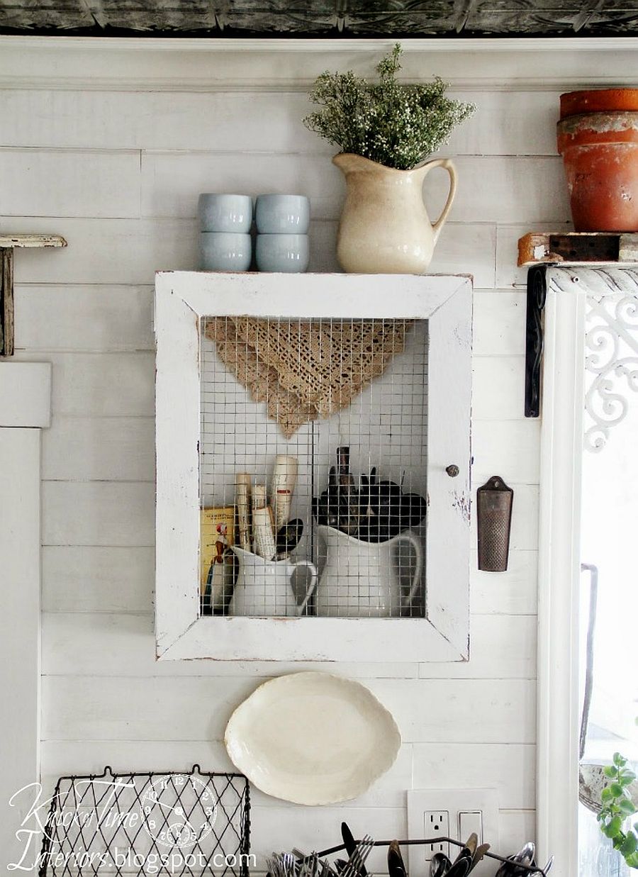 Farmhouse style wall cabinet made from reclaimed wood and chicken wire is a showstopper!