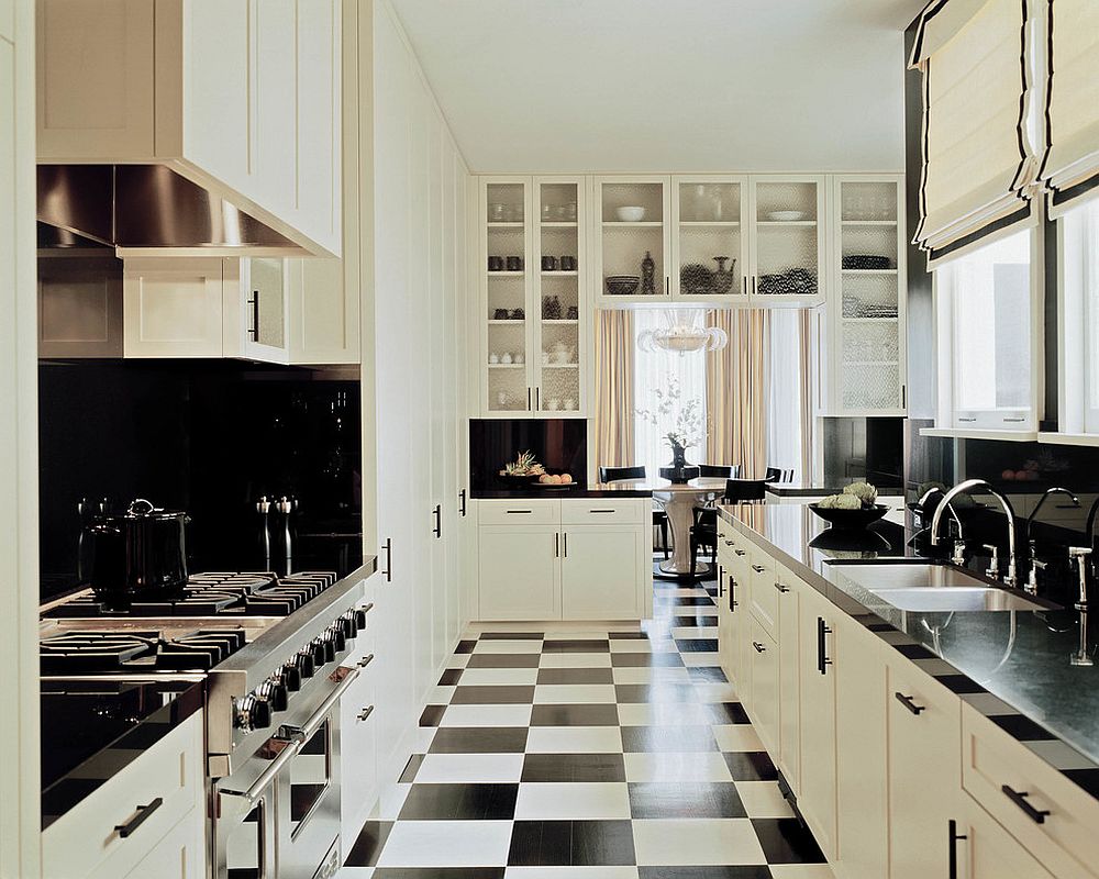 Floor tiles add to the black and white color scheme of the kitchen