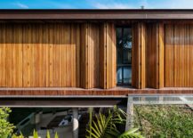 Folding-wooden-doors-allow-the-homeowners-to-shift-between-privacy-and-lovely-views-217x155