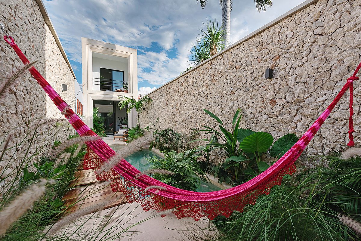 Gorgeous green private yard of the holiday home with pool