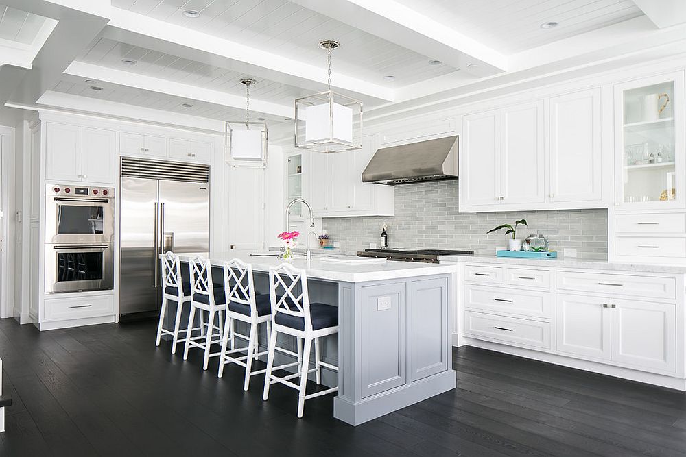 It is flooring and tiles that add gray to the white kitchen