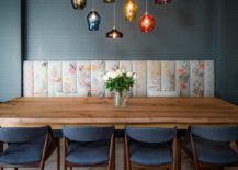 Lovely-blue-backdrop-multi-colored-lighting-and-wooden-ceiling-for-the-eclectic-dining-space-217x155