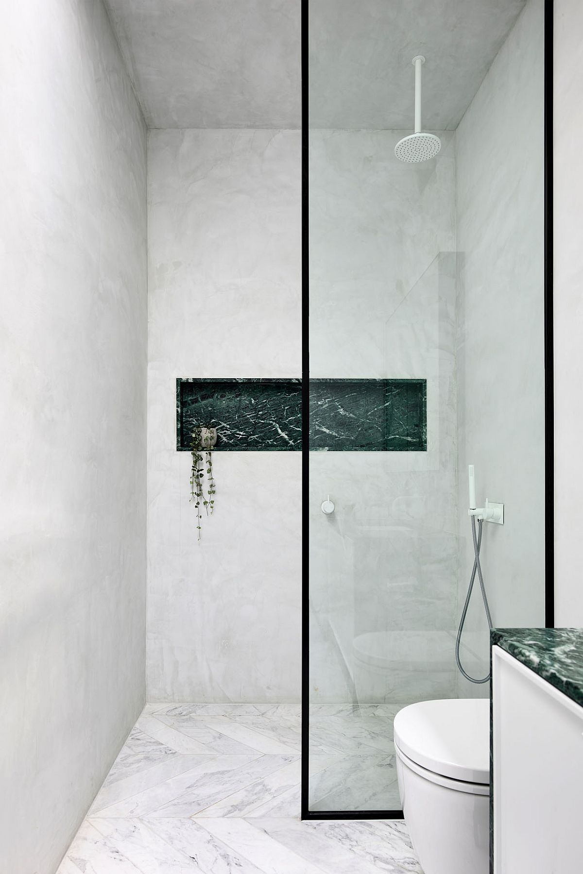 Minimal contemporary bathroom in white with a touch to accentuate its style
