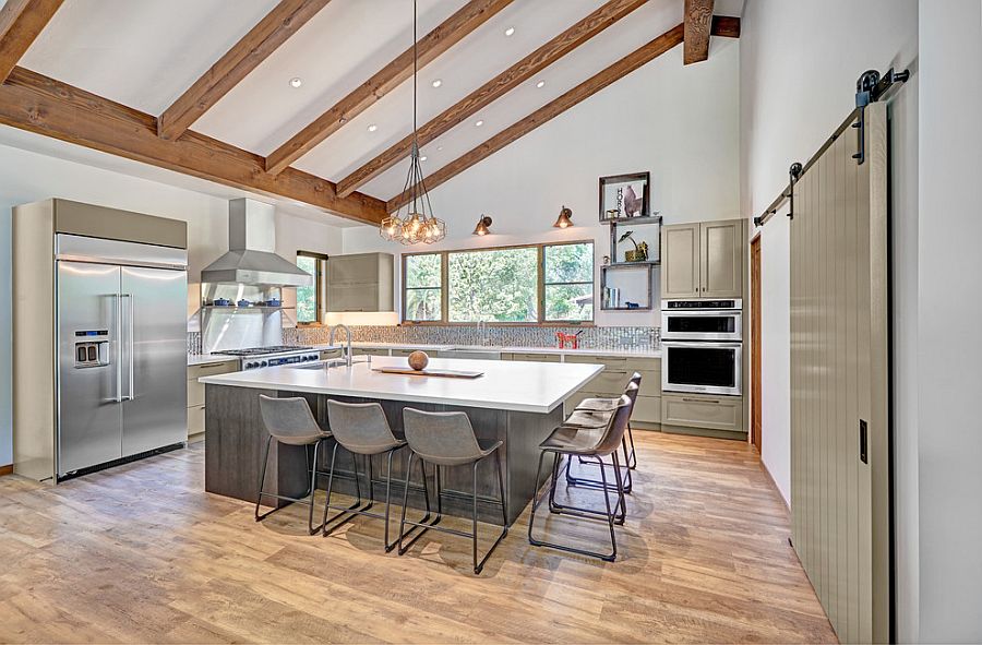 Modern farmhouse kitchen with sloped celing and wooden beams