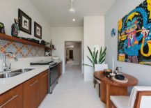 Narrow-kitchen-and-casual-breakfast-nook-in-white-and-wood-with-a-pinch-of-color-217x155