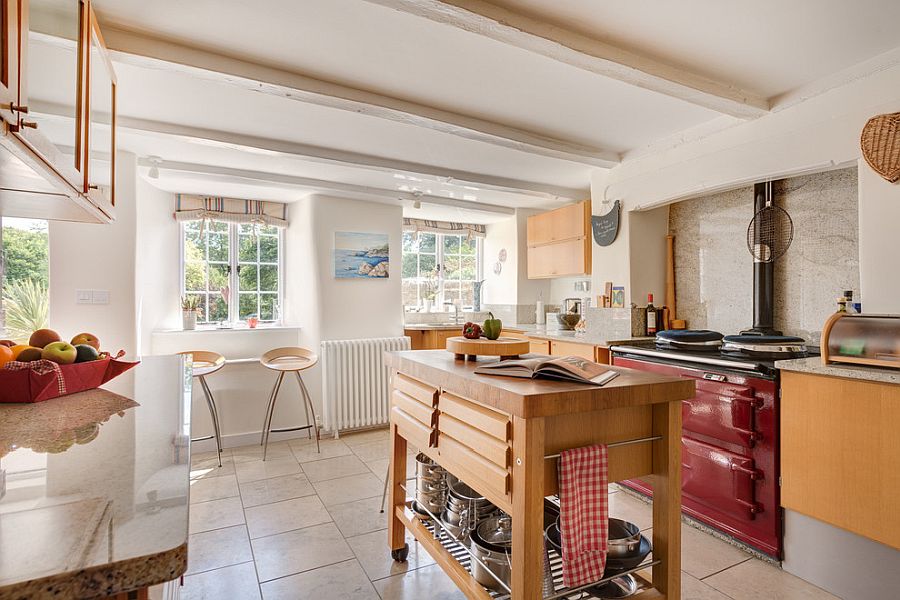 Open shelf space below the kitchen island helps yoy put away pots and pans with ease