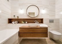 Polished-minimal-bathroom-in-white-with-a-floating-wooden-vanity-217x155