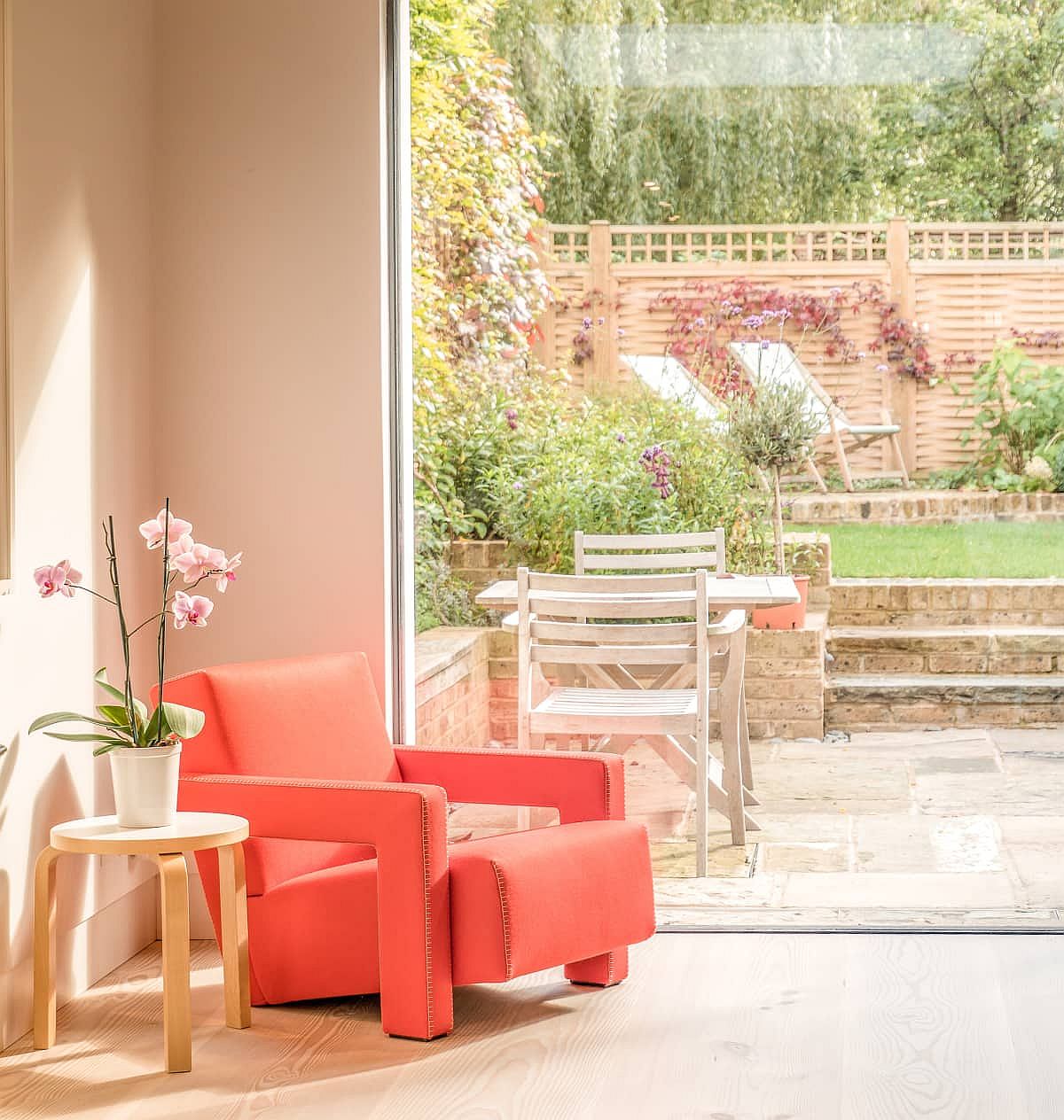 Pop of pink brought into the living space using the comfy armchair