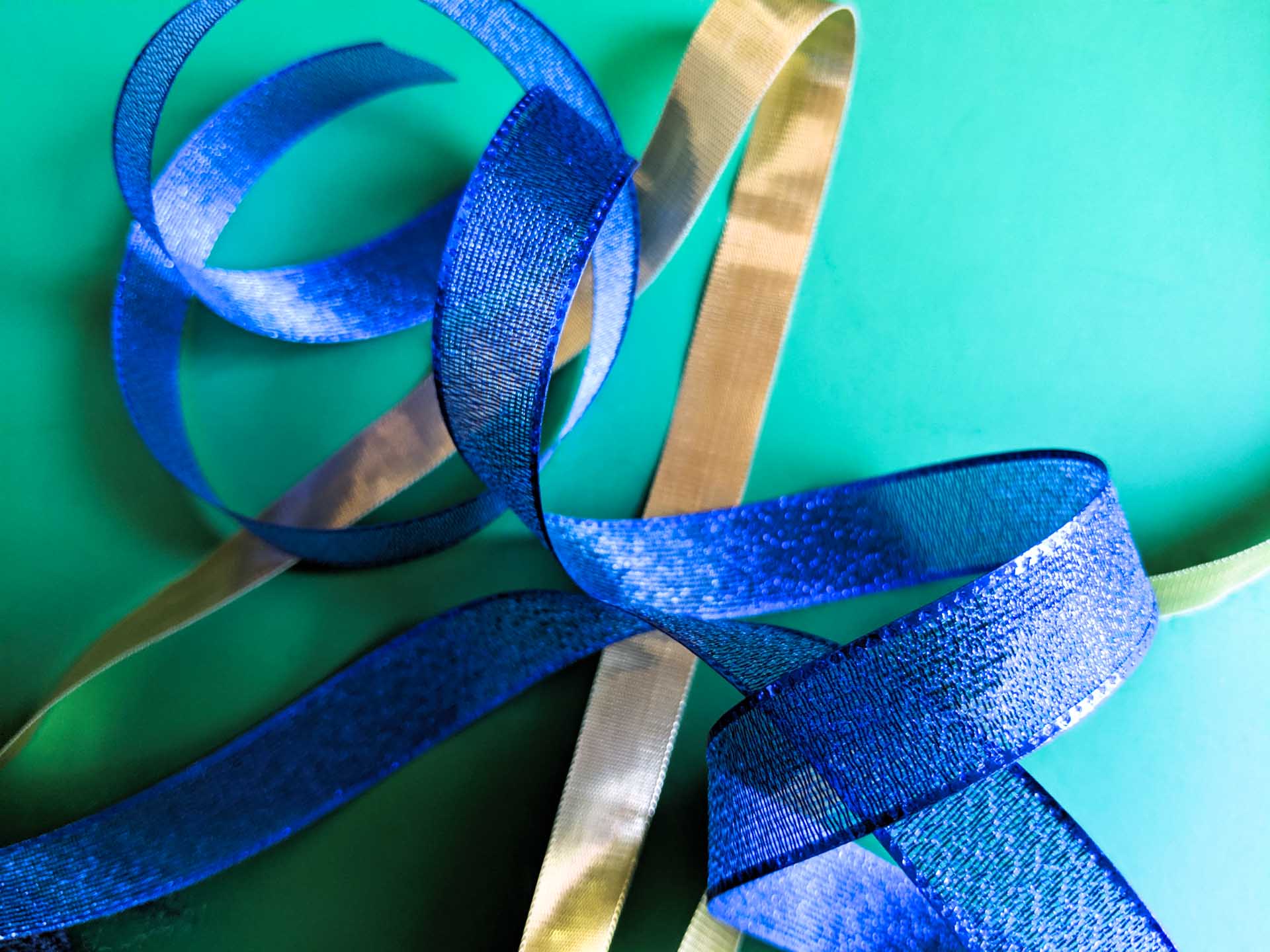 Shiny-blue-and-gold-ribbon