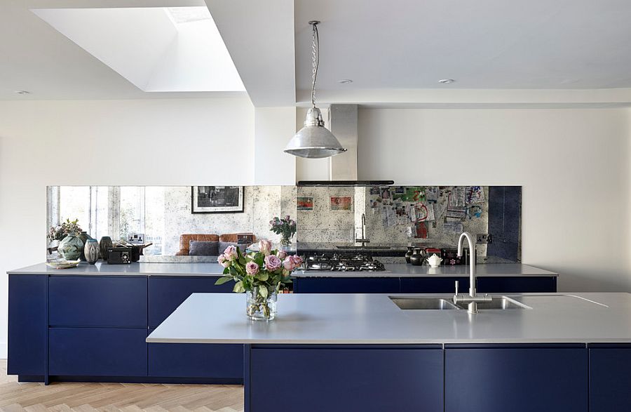 Skylight and mirror backsplash transform this once dark and boring kitchen