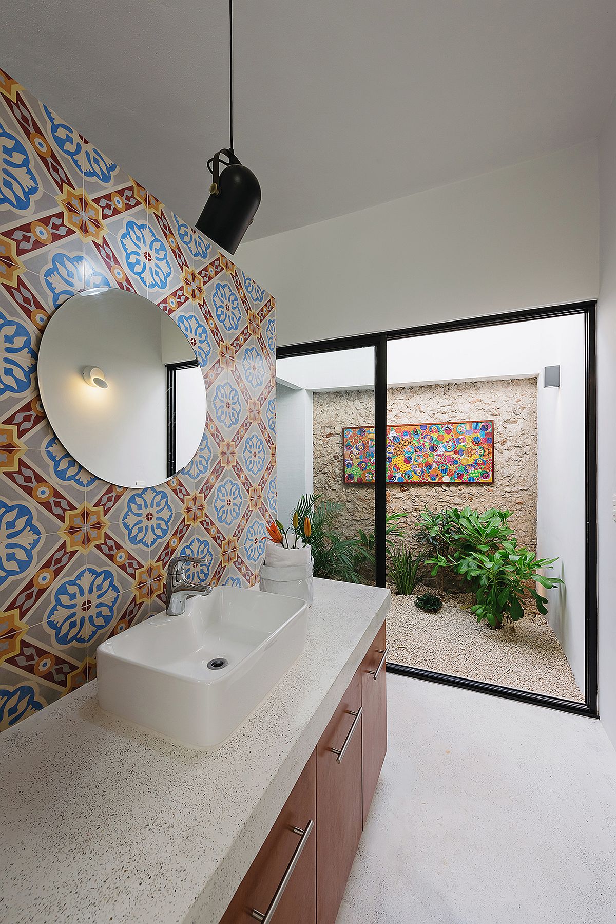 Small outdoor atrium brings light into the bathroom