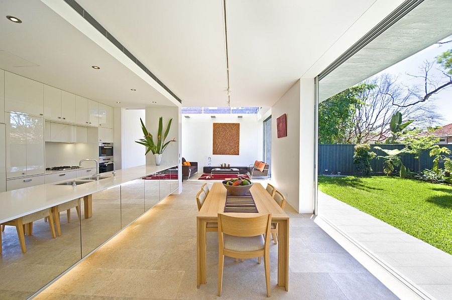 Stunning use of mirrored surfaces in the kitchen along with outdoorsy charm to enliven the kitchen