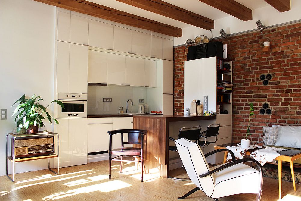 Tiny-apartment-kitchen-in-Prague-combines-white-with-brick-wall-charm