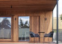 Warmth-of-wood-stands-in-contrast-to-the-drak-metallic-exterior-217x155