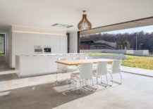 White-and-wood-open-kitchen-design-with-concrete-floor-217x155