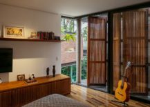 Wooden-shutter-style-doors-for-the-upper-level-bedrooms-217x155