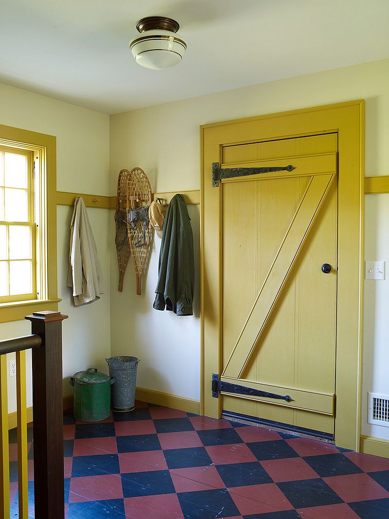Yellow-single-door-for-the-vintage-farmhouse-style-entry-of-New-York-home