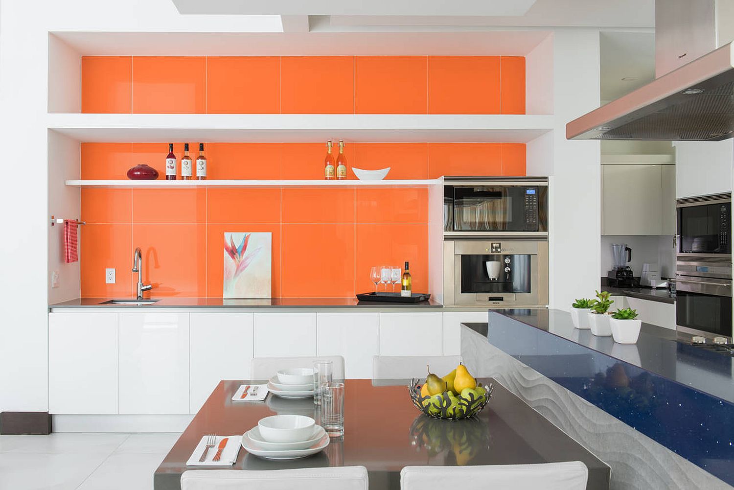 Bold orange backsplash for the polished contemporary kitchen