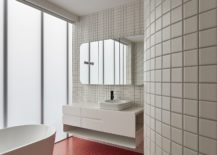 Bright-red-tiles-for-the-floor-in-the-moern-white-bathroom-217x155