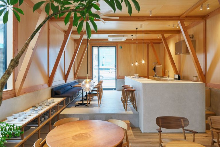 Modern Japanese Café with a Cozy Residence Above Makes a Woodsy