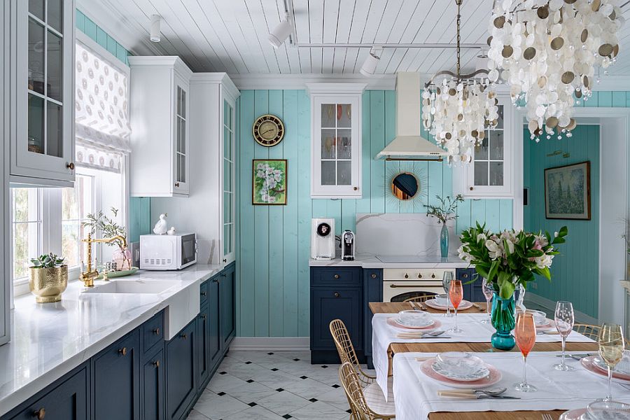 Combing blue, white and gray in the beach style kitchen and dining space with ease