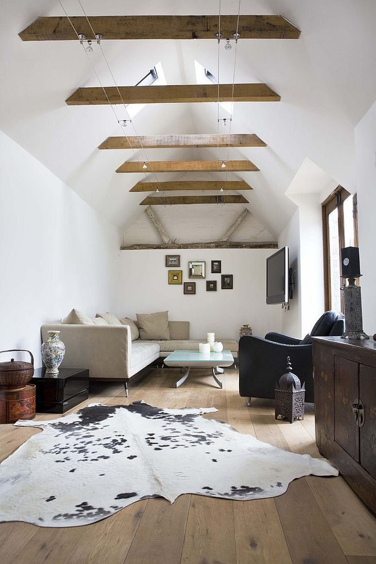 Double-height living room of London home with innovative use of ceiling beams