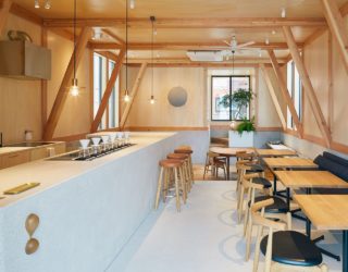 Modern Japanese Café with a Cozy Residence Above Makes a Woodsy Impression