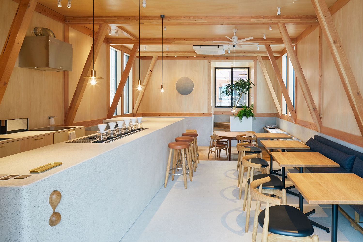 Modern Japanese Café with a Cozy Residence Above Makes a Woodsy ...