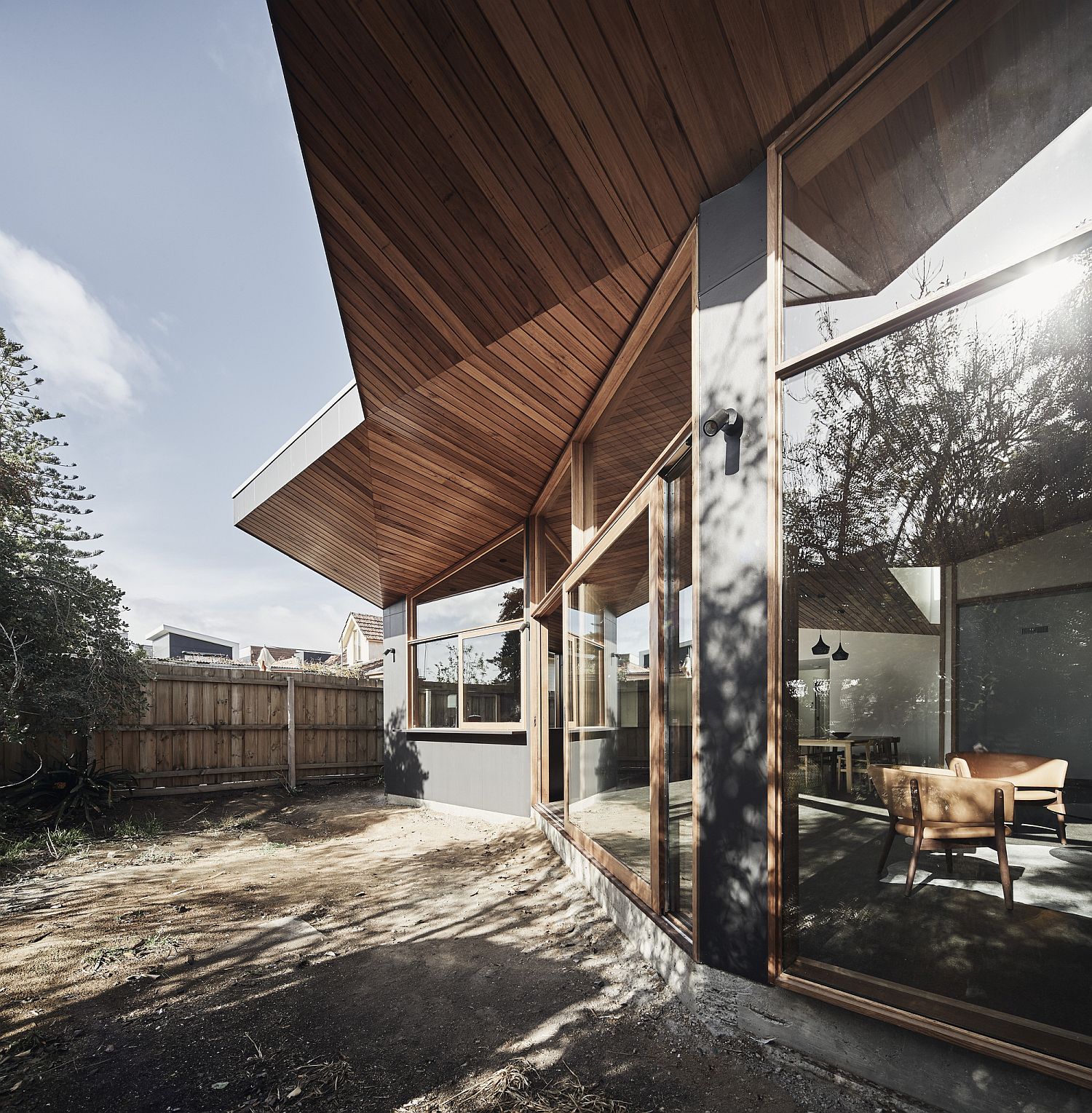 Folded wooden ceiling design of the modern extended AUssie home