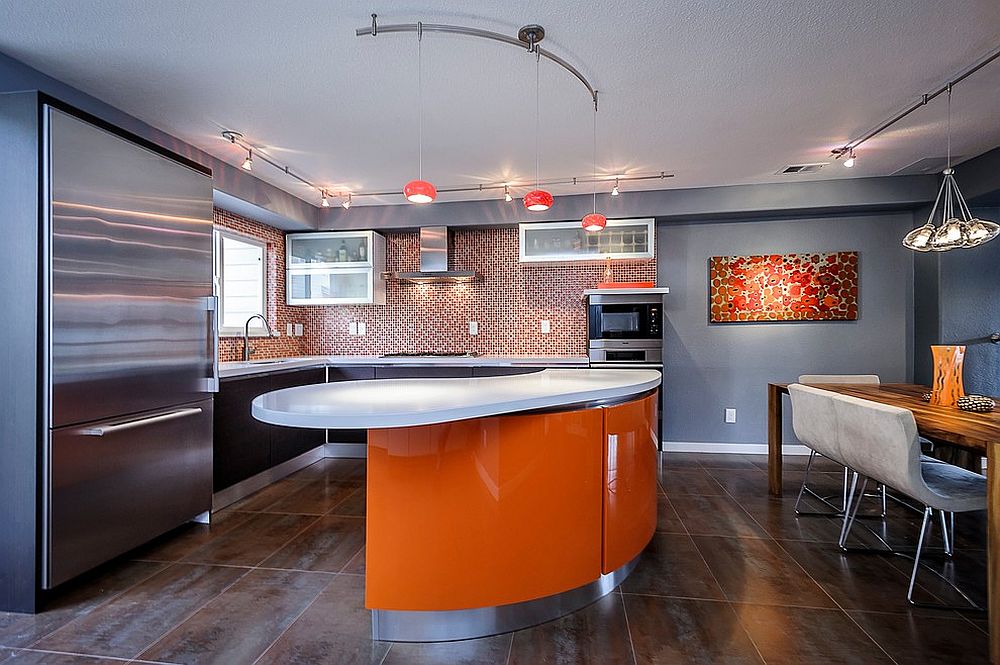 Modern kitchen with a bright island and pendants in matching hue