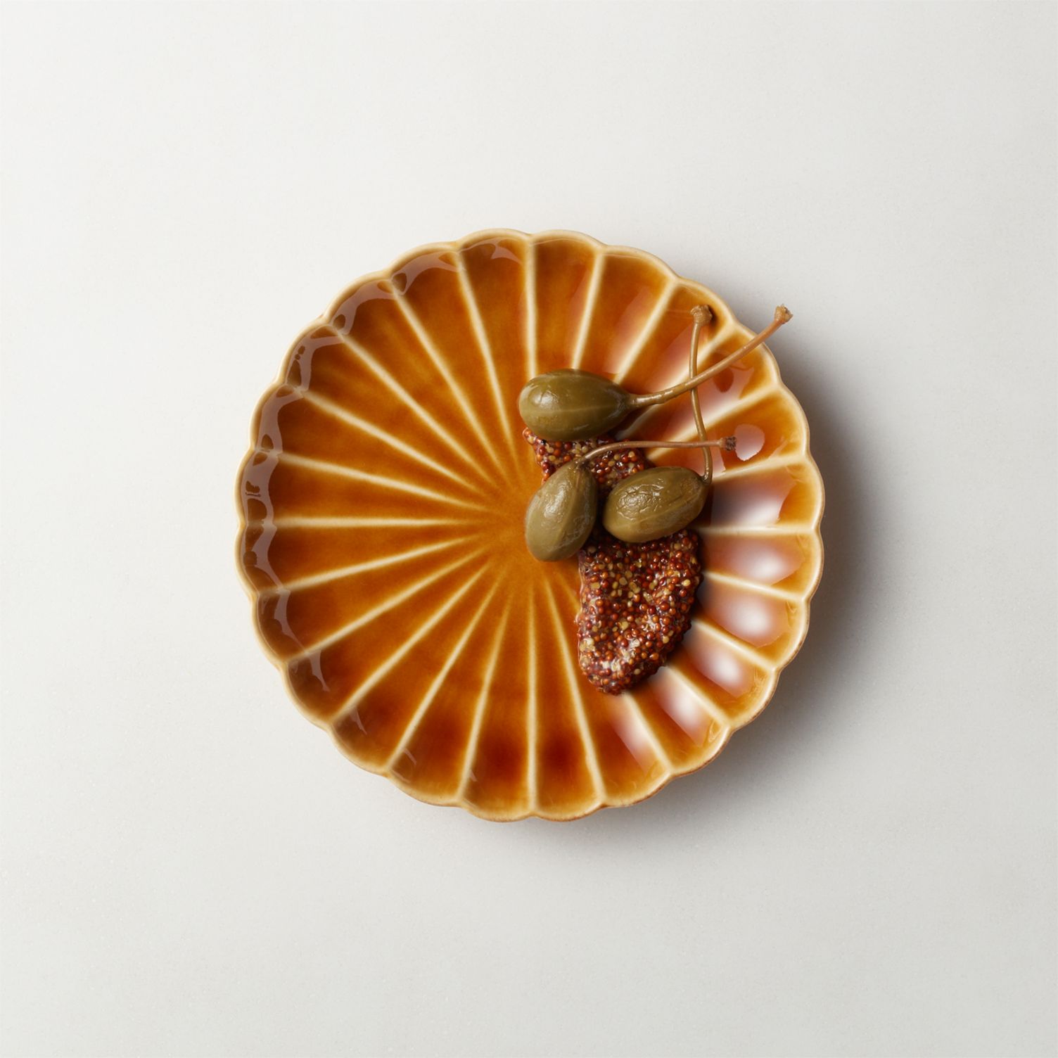 Scalloped-appetizer-plate-in-camel-brown