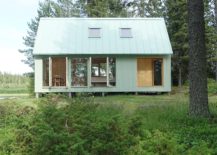 Tall-trees-and-natural-greenery-surround-the-cabin-on-the-island-217x155