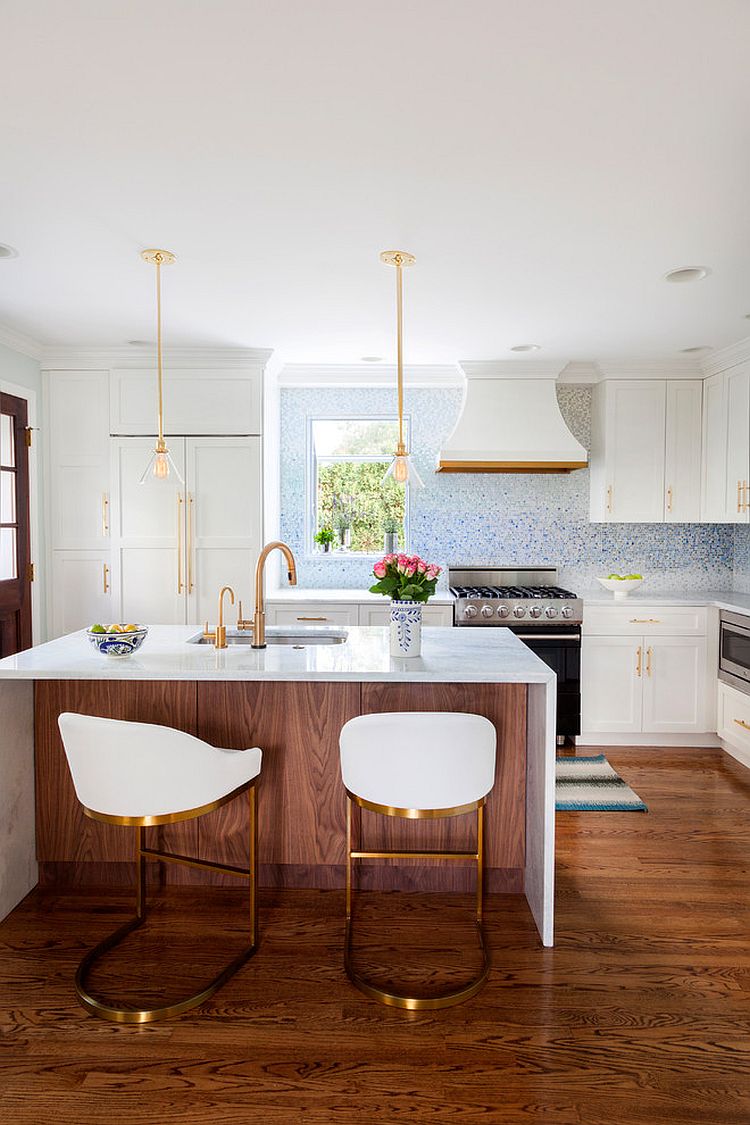 Use the bar stools to add metallic charm to the modern kitchen