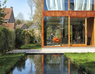 Minimal Concrete, Steel and Glass Home Wrapped in Cloak of Greenery