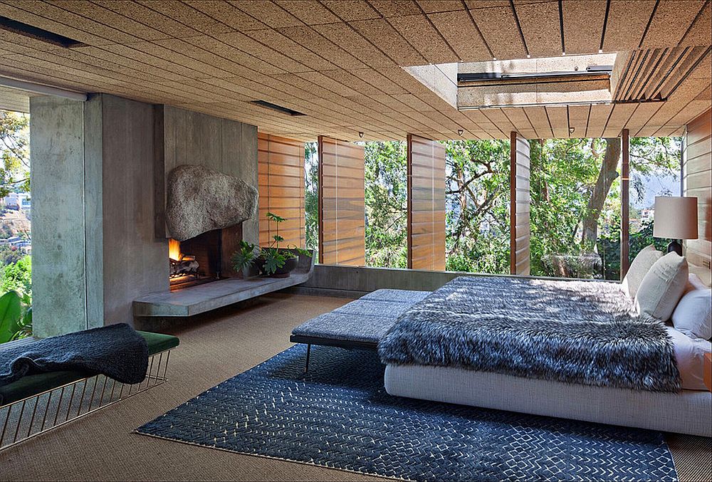 Ceiling and concrete walls give the modern bedroom a different visual appeal