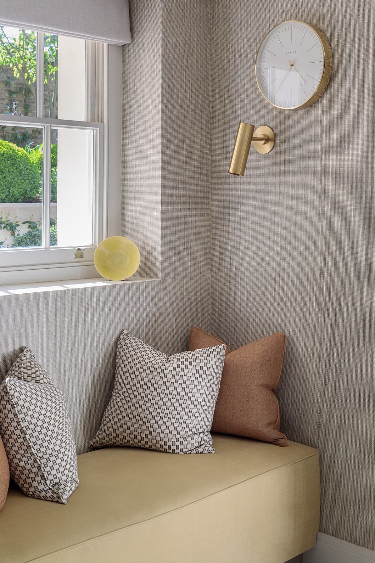 Comfy window seat with lighting that feels cozy