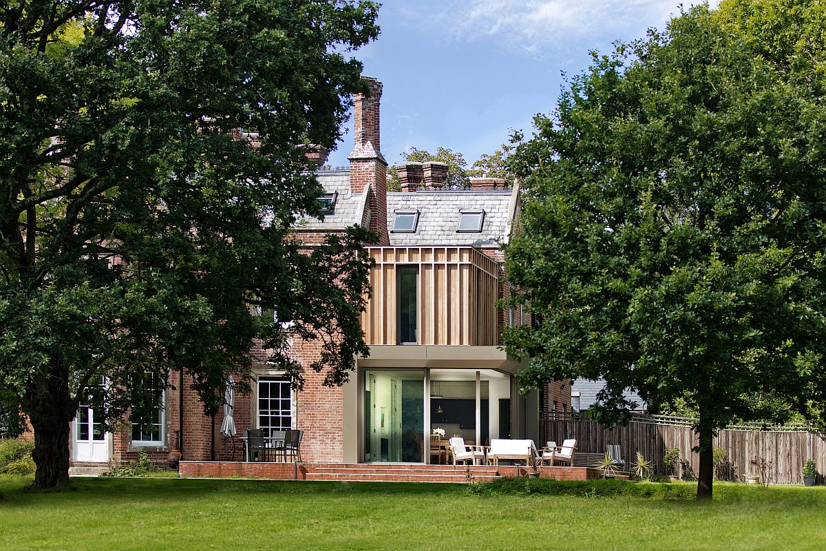 Contemporary extension to the historic family home is visible from a distance