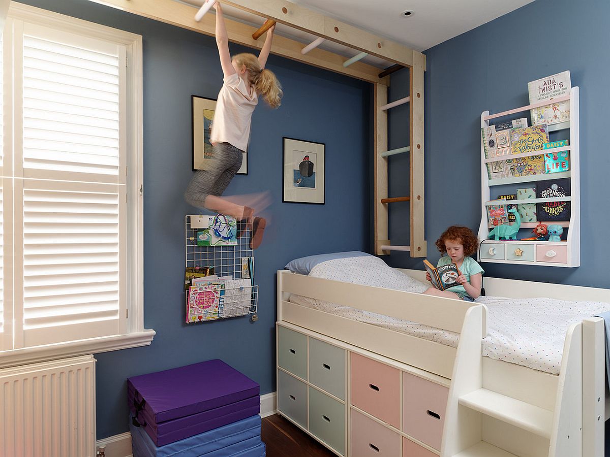 Dashing kids' bedroom with climbing wall, monkey bars and smart under bed storage