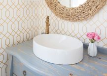 Decor-with-distressed-finishes-add-to-the-coastal-look-of-the-ultra-tiny-powder-room-217x155