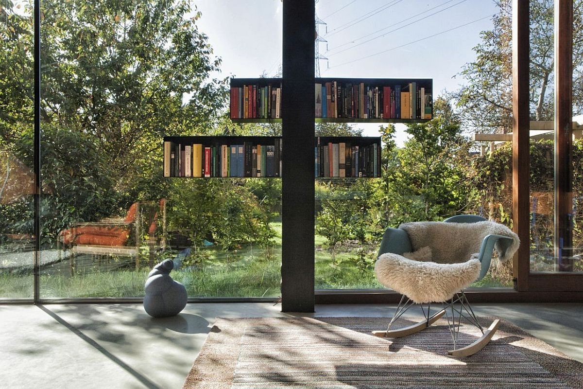 Innovative bookshelves add color to the minimal modern living area